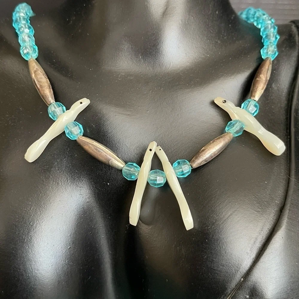 Native Sterling silver unmarked mother of pearl bird carved necklace